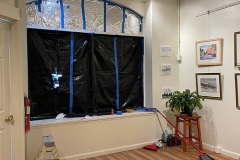 Interior of Gallery with black plastic and alum foil on windoes