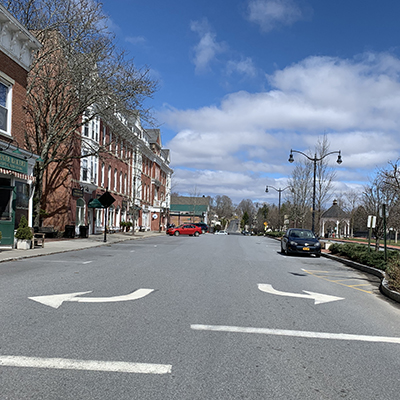 empty main street of village at high noon
