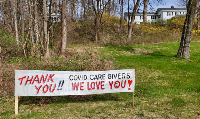 hand painted sign thank you covid care givers we love you