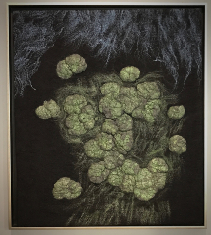 Fiber art green lichens on darker background