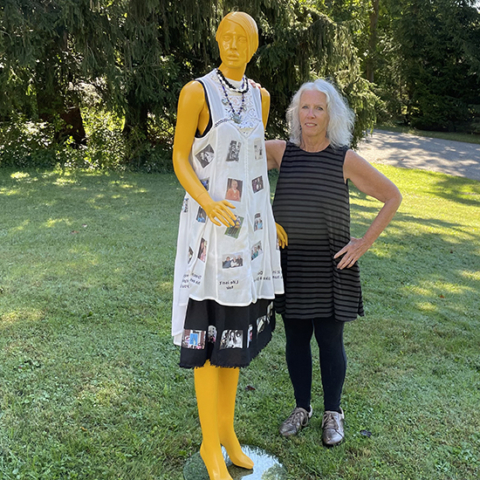 mannequin on front lawn with creator Lonna Kelly