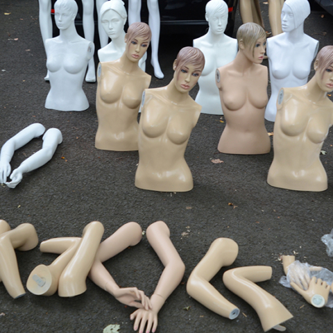 mannequin pieces placed in driveway