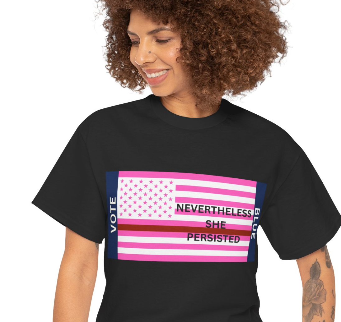 Curly haired woman in black tee shirt with pink womens lives matter and the text nevertheless she persisted